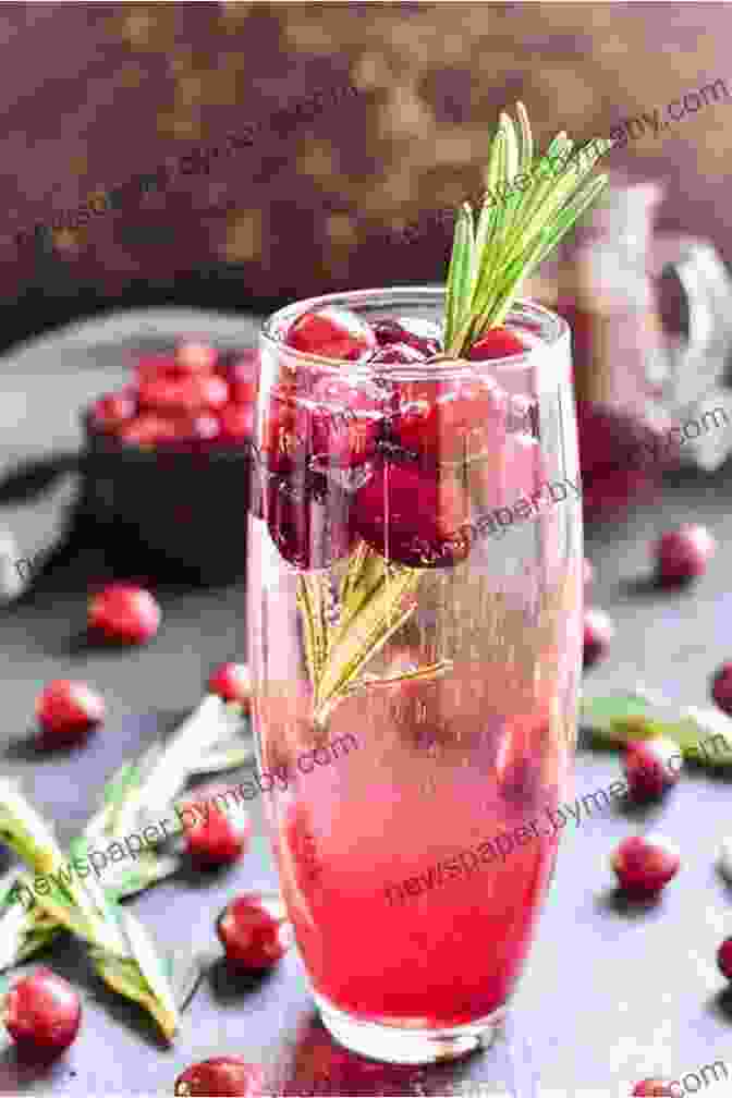 A Bubbly Glass Of Cranberry Mimosa Garnished With Fresh Cranberries Creative Holiday Cocktails With Cocktails Recipes For Merry Holiday And Great Parties