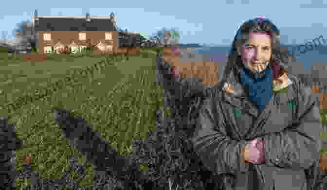 A Photograph Of Juliet Blaxland And Her Dog, Friday, Sitting On A Rocky Outcrop Overlooking The Ocean. The Easternmost House Juliet Blaxland