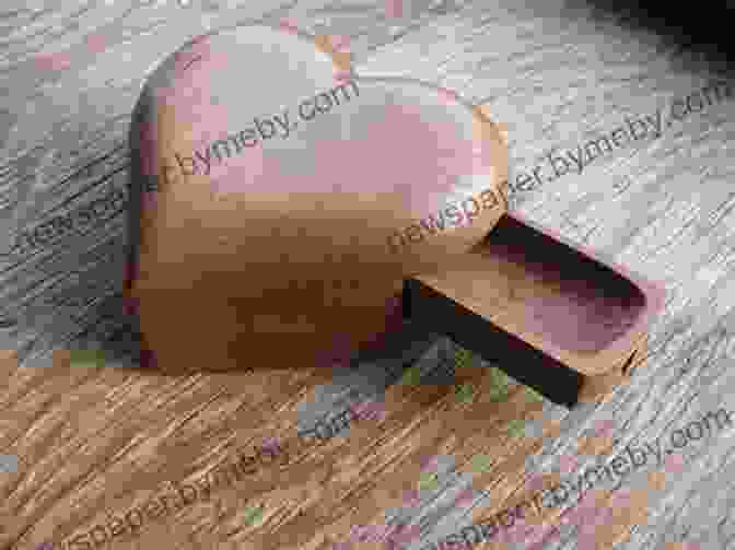 A Wooden Heart Shaped Box With A Small Keyhole And Metal Accents Heart Shaped Box: A Novel Joe Hill