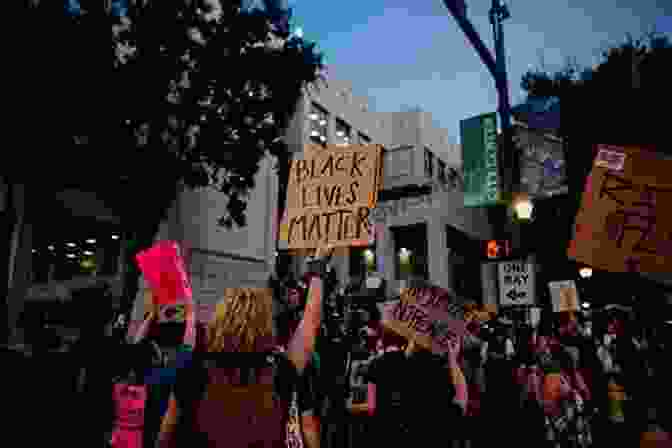 An Image Depicting A Political Rally, With A Group Of People Holding Signs And Shouting Slogans. The Collapse Of Complex Societies (New Studies In Archaeology)