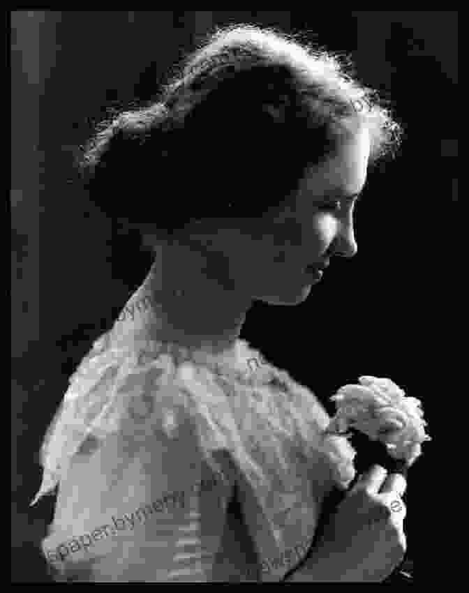 Helen Keller, A Young Woman With A Serene Expression, Is Photographed In Profile. She Is Wearing A Simple Dress And Her Hair Is Pulled Back Into A Loose Bun. Keller Is Deafblind, And She Is Using Sign Language To Communicate With Someone Out Of Frame. DK Life Stories Helen Keller