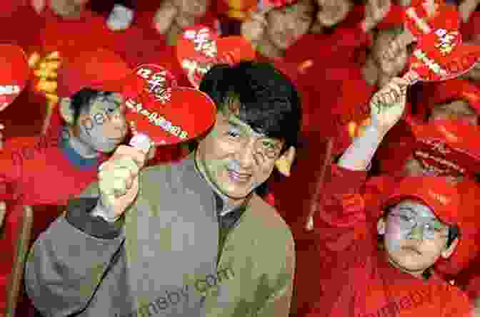 Jackie Chan Interacting With Children, Highlighting His Extensive Charitable Work Through The Jackie Chan Foundation. Who Is Jackie Chan? (Who Was?)