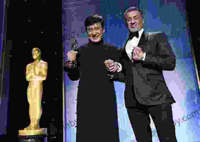 Jackie Chan Receiving A Standing Ovation From An Audience, Symbolizing His Enduring Legacy As A Global Superstar. Who Is Jackie Chan? (Who Was?)