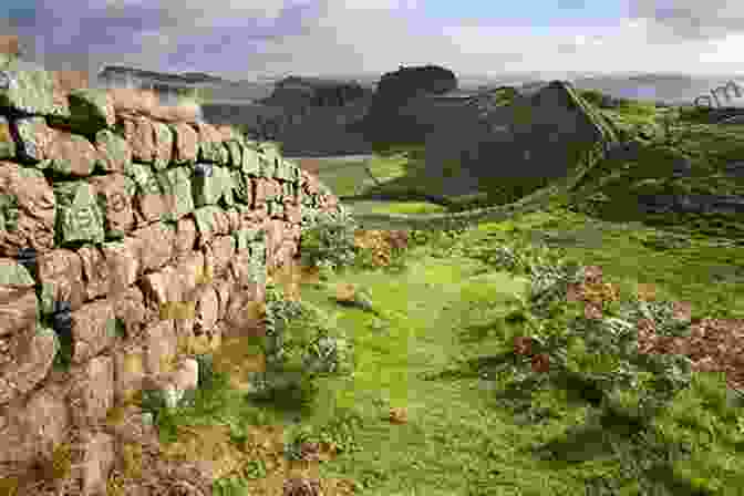 Ruins Of Hadrian's Wall, A UNESCO World Heritage Site, Amidst The Rolling Hills Of Northumberland The Marches: A BFree Downloadland Journey Between England And Scotland