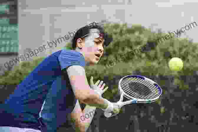 Tennis Player Focusing On The Ball, Representing Mental And Emotional Training Mental And Emotional Training For Tennis